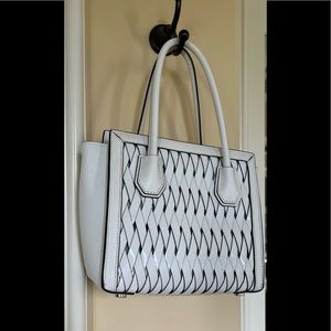 White w/silver accents, Michael Kors top handle/cross body never used handbag.